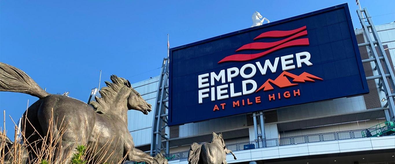 Empower Field at Mile High sign mounted on stadium