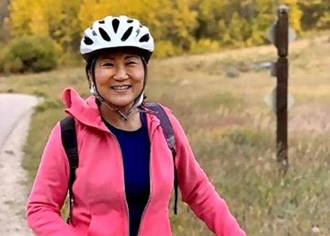 Emily Chen - Empower Retirement associate - riding bicycle