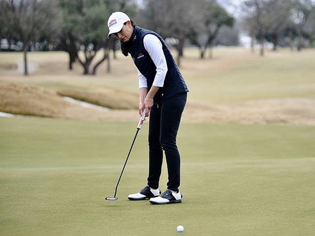 Cheyenne Knight, LPGA golfer, lines up a putt