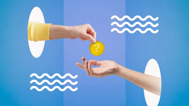 Two hands exchange a gold coin