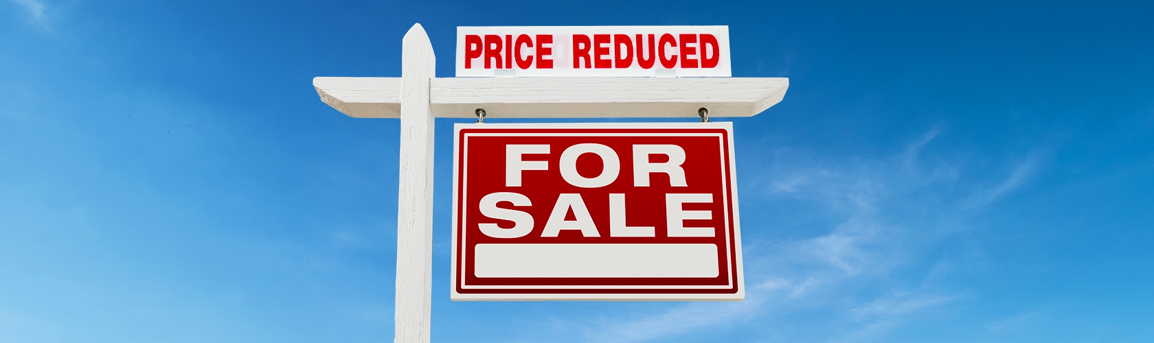 For sale sign with Price Reduced