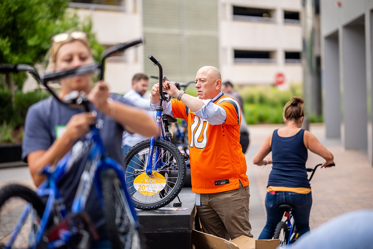 Empower associates work on bicycles for donation